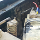 The battery was being over-charged and boiled over, emitting a horrible noxious smell.